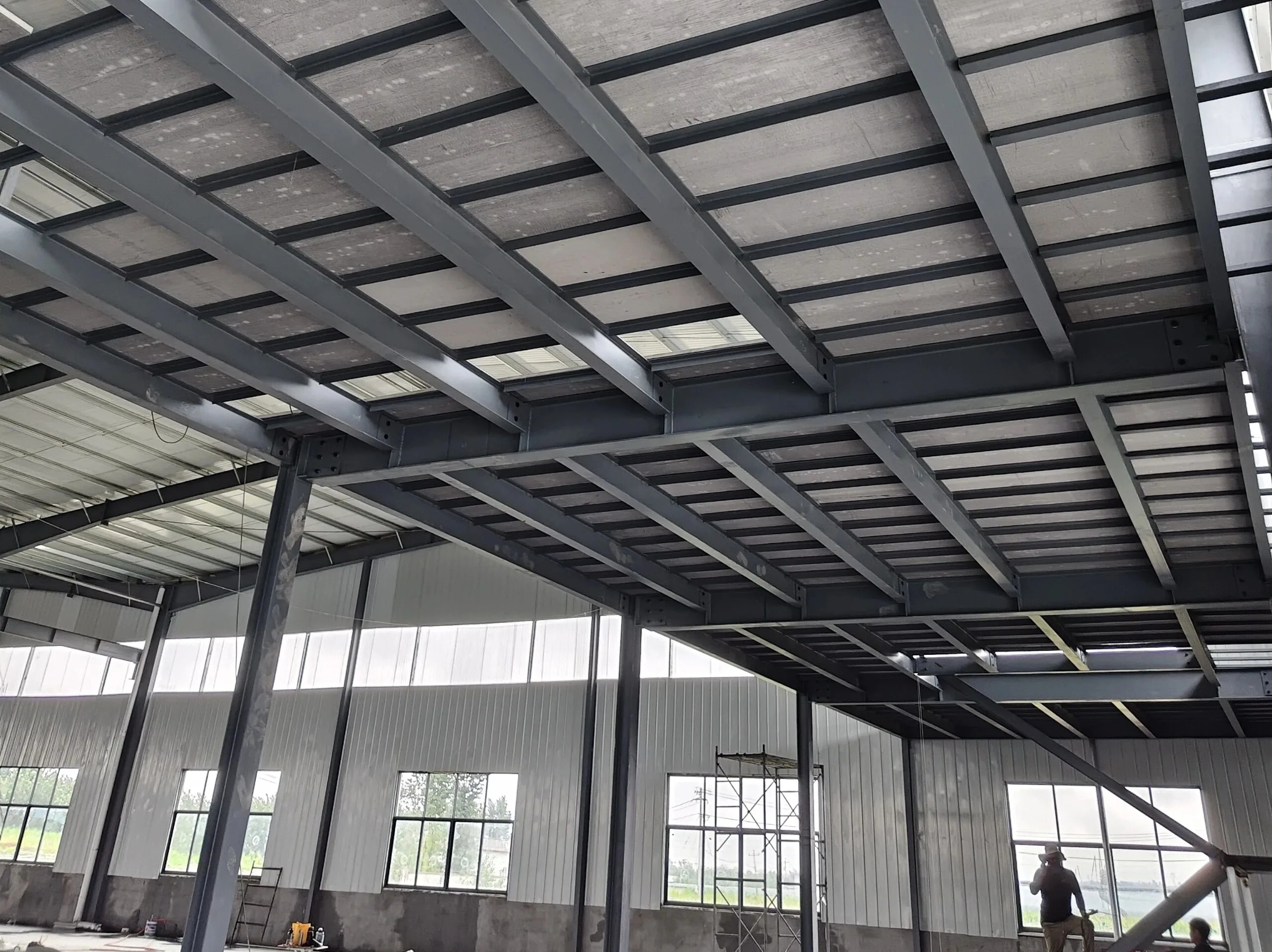 Mezzanine Decking: Steel Plate vs Bar Grating vs Cement Board