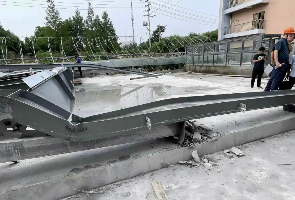 Post-Disaster Forensic Photo Showing Sheared Baseplates and Skewed Columns